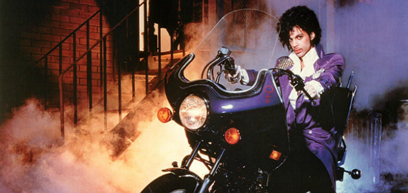 Prince and his frilly shirt on the cover of 1984’s Purple Rain